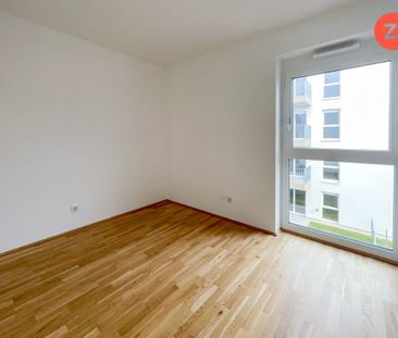 Schöne geförderte 3-Zimmer-Wohnung mit Tiefgaragenparkplatz und Log... - Foto 1