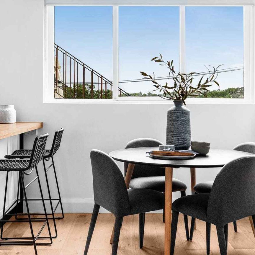 SEMI-STYLE APARTMENT IN QUIET BOUTIQUE SETTING - Photo 1