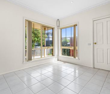 Spacious Three-Bedroom Unit with Double Garage and Outdoor Entertai... - Photo 4