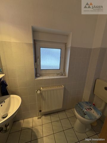 große DG-Wohnung mit Gartenanteil - Photo 3