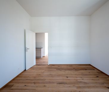 Stilvolle 2.5 Zimmer-Wohnung mit Altbaucharme - Foto 4