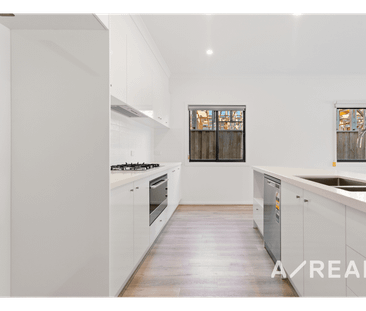 Modern 4-Bedroom Family Home in Weir Views - Photo 3