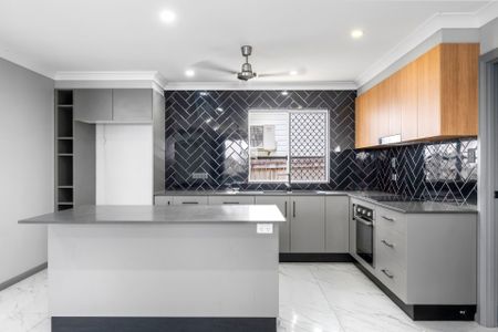 Charming Renovated Home with Shed - Photo 3