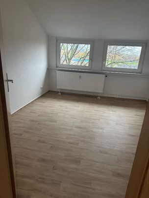 Kleine gemütliche Dachgeschosswohnung im Tribseer! - Photo 1