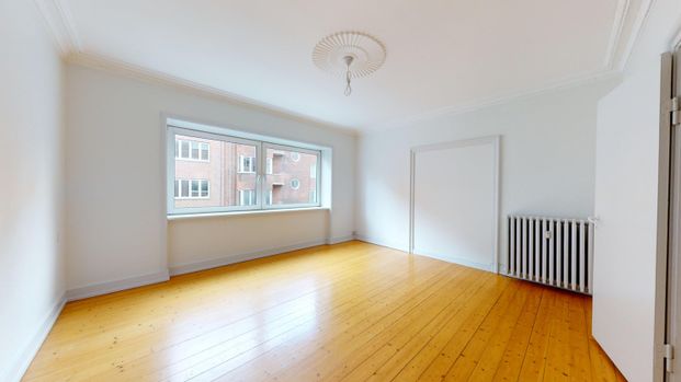 <b>Centralt byliv og rolig altanhygge – perfekt delelejlighed til to</b> - Photo 1