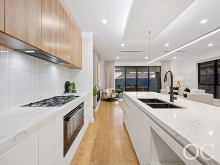 Open the Door to Luxe Living with Designer Finishes - Photo 5