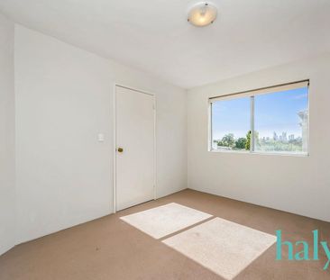 Convenient Living in the Heart of Victoria Park - Photo 1