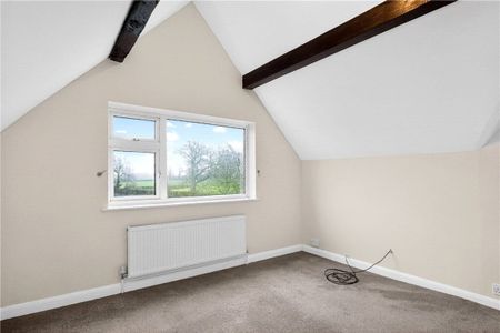 A four bedroom detached family home with a gated driveway in Marston. - Photo 3