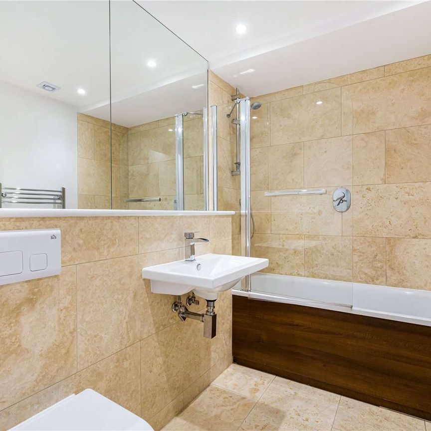 A lovely one bedroom flat in a unique development in Wimbledon. - Photo 1