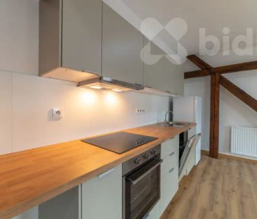 Pronájem bytu 2+1 v centru Vizovic - Fotografie 1