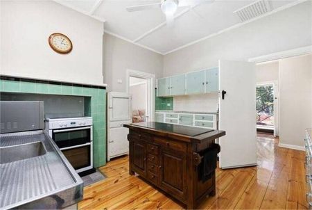 Beautifully restored 1950s home on large block with big sheds. - Photo 2