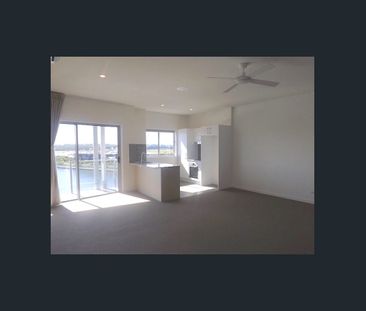 AMAZING WATER VIEWS FROM YOUR TOP FLOOR APARMENT - Photo 6