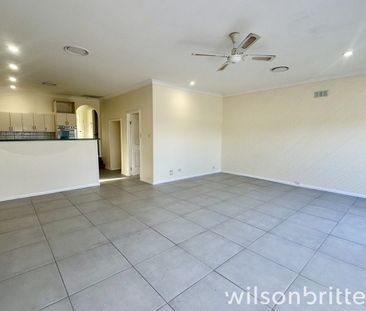 Modern 4-Bedroom Family Home with Internet & Water Included In Cent... - Photo 6