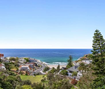 Stylish One-Bedroom Designer Beachside Apartment with Spectacular Views and Secure Parking - Photo 1