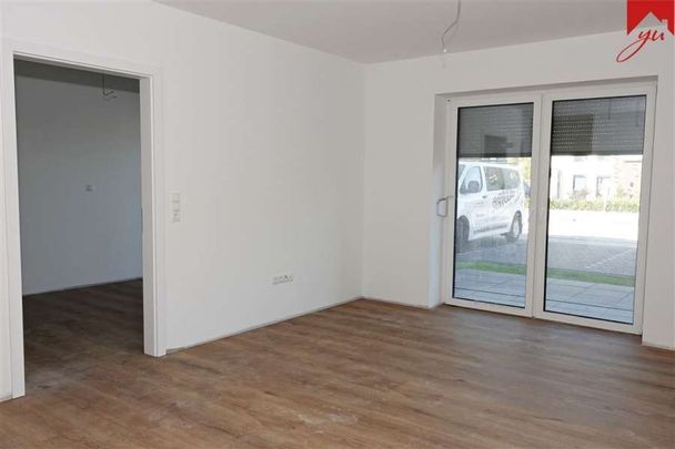 Neue Erdgeschosswohnung mit Terrasse in zentraler und ruhiger Lage von Schortens! - Foto 1