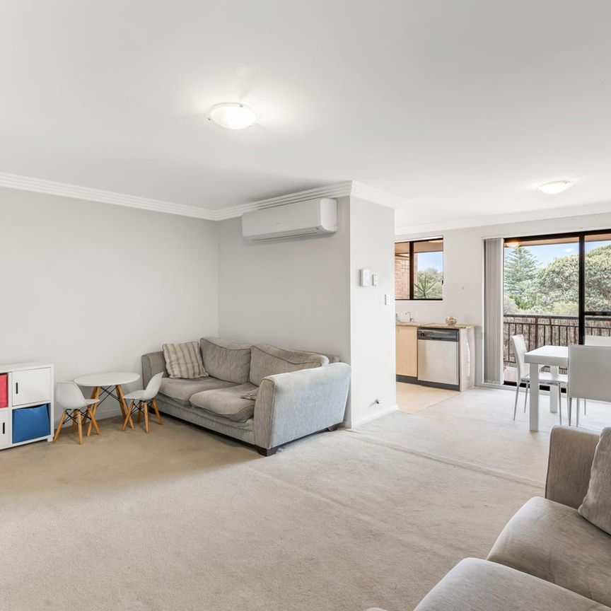 Top floor unit in central location - Photo 1