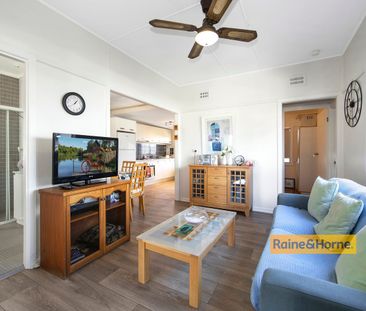 FAMILY HOME WITH WATER USE INCLUDED! - Photo 1