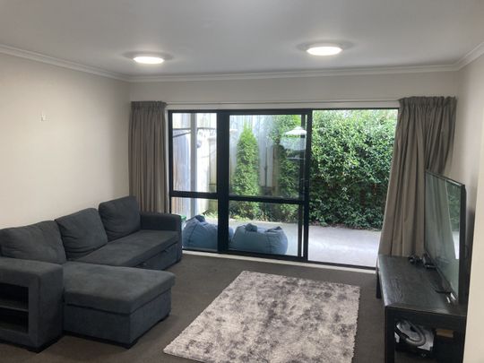 This stylish and well-presented townhouse offers comfortable, low-maintenance living in an unbeatable location. - Photo 1