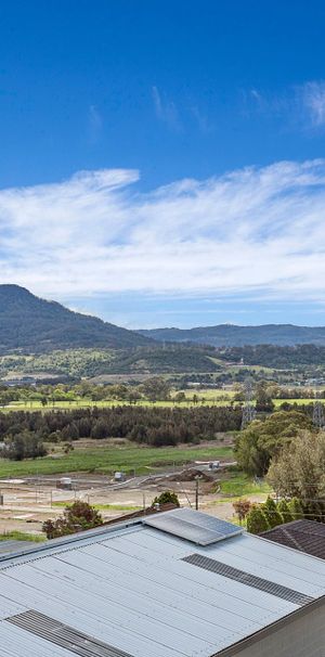 Easy-care Ground Floor Living | Renovated 2-bedroom Unit - Photo 1