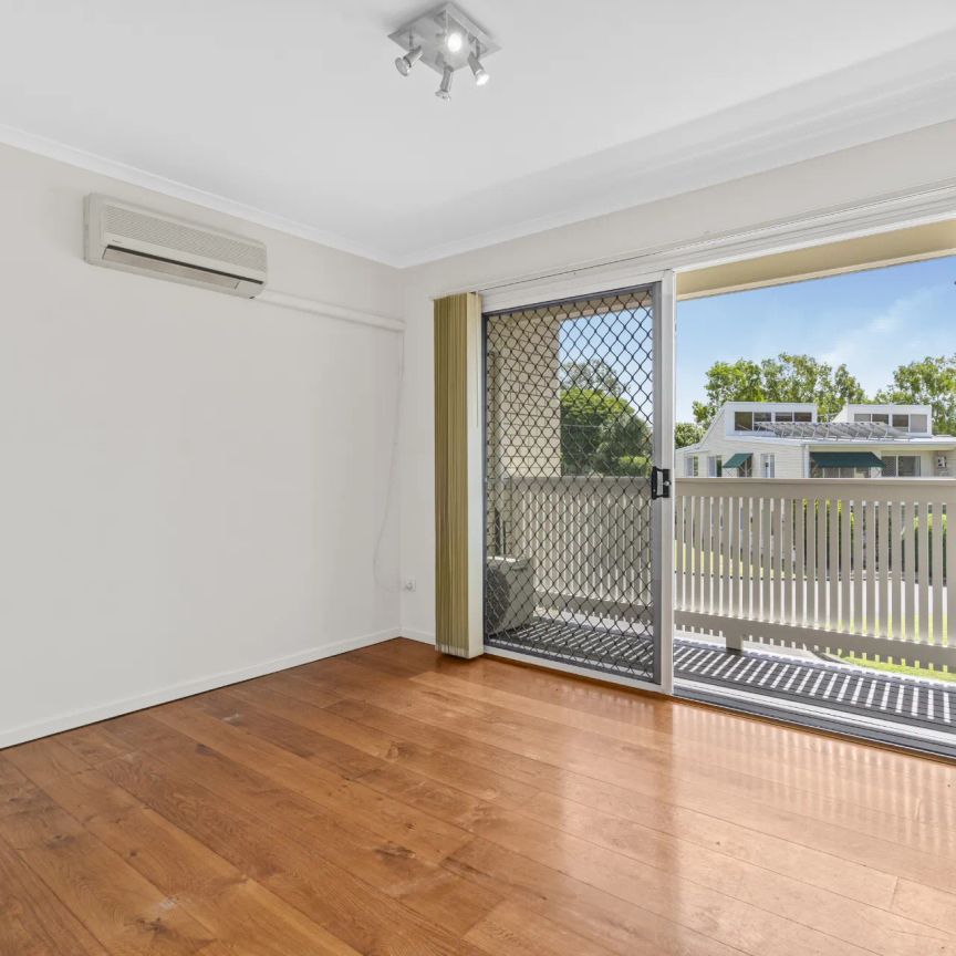 Dual-Level Living Overlooking Parklands - Photo 1