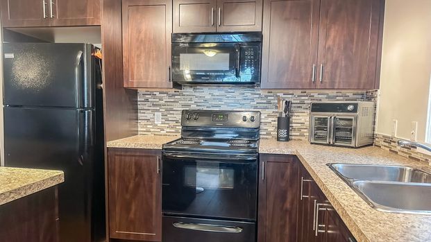 Bright & Air Conditioned 2 Bed Condo In Copperfield | 2 Parking Stalls Special Incentive - Photo 1