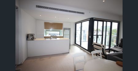Conveniently Located Mid Level Modern Apartment with Pleasant Views & Complex Facilities - Photo 4