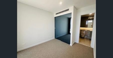 PREMIUM HIGH-RISE APARTMENTS SET WITHIN THE BESPOKE COMMUNITY OF MACQUARIE PARK - Photo 2