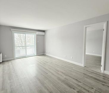 Grand 5½ rénové, 3 chambres, clim, 2 stationnements + rangement pri... - Photo 1