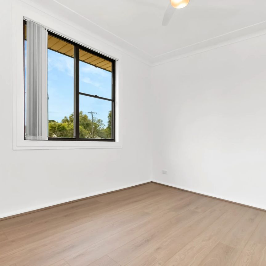 Freshly Renovated Home with Modern Comforts - Photo 1