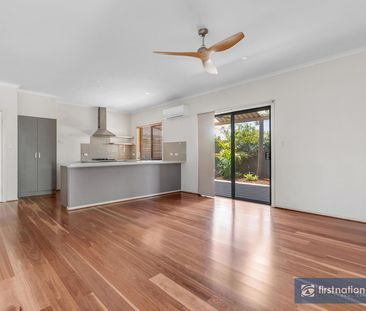 IMMACULATE AND WELL APPOINTED THREE BEDROOM HOME - Photo 1
