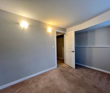 Cozy 2 Bed Basement Suite in North Glenmore In Suite Laundry & Shar... - Photo 1