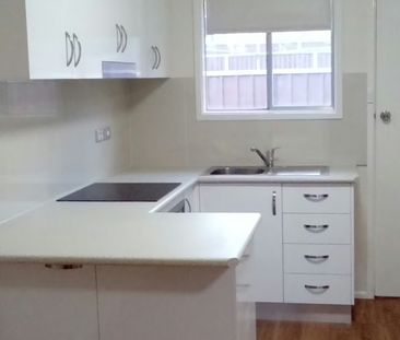 NEAT & MODERN 2 BEDROOM UNIT - Photo 2