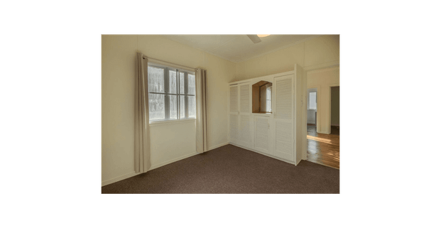 Charming High-Set Queenslander Offering Comfortable Family Living - Photo 1