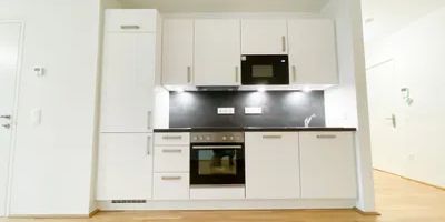 Gepflegte 2-Zimmerwohnung mit Balkon im preisgekrönten Wohnquartier "THEOs" - Foto 3