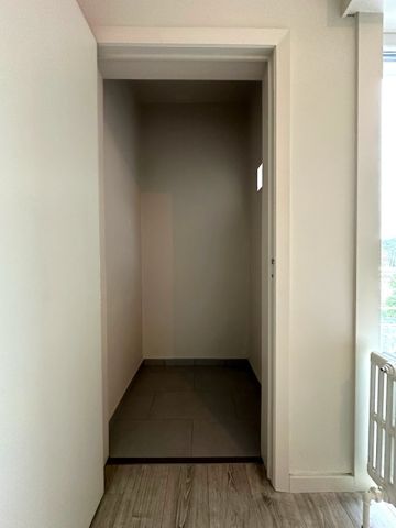 Lichtrijk appartement met drie slaapkamers - Photo 5