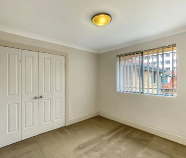 Split Level 2 Bedroom Unit! - Photo 2