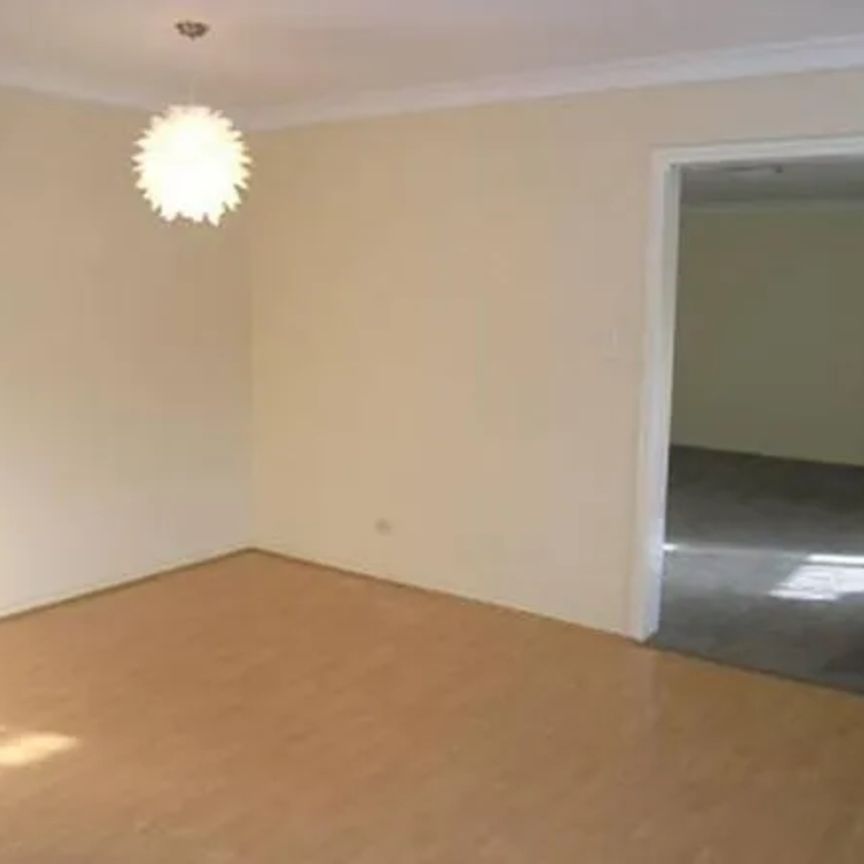 Convenient Ground-Floor Living in a Prime Location - Photo 1