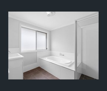 Spacious Family Living Awaits in This Stunning 4-Bedroom Home - Photo 5