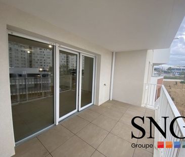 T3 AVEC LOGGIA + PARKINGS - Photo 5