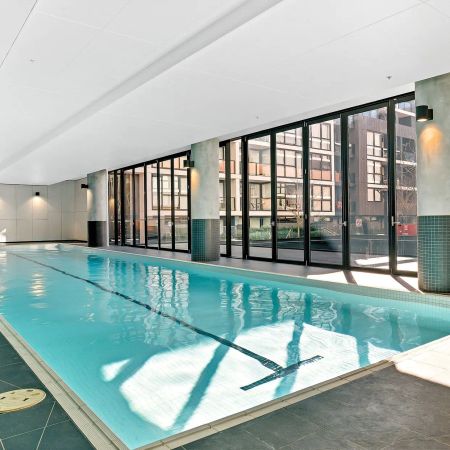 Sleek Apartment Living in Abbottsford's Precinct Complex - Photo 4