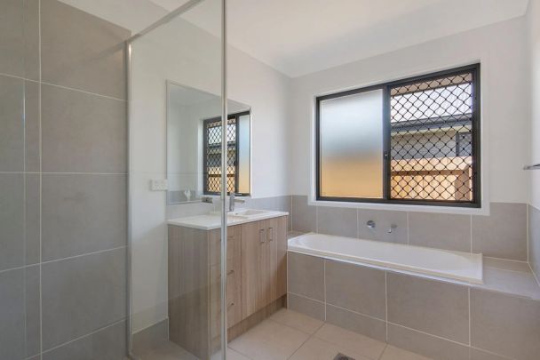 A modern sanctuary in a peaceful, family-friendly pocket, this beautifully finished 4-bedroom home delivers effortless living with a touch of luxury. - Photo 1