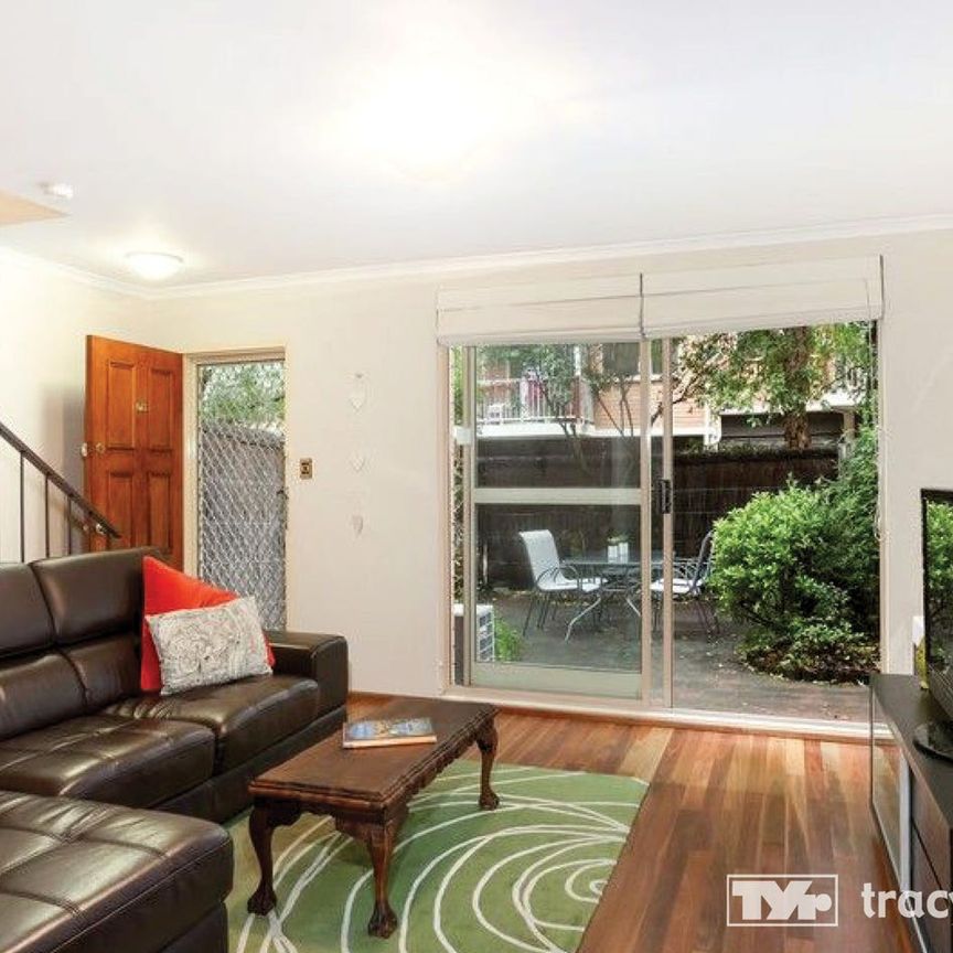 Spacious 2-Bedroom Townhouse In Perfect Location - Photo 1