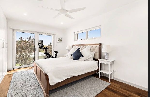 Newly Renovated Family Home with Spacious Layout and Multipurpose Backyard Retreat - Photo 1