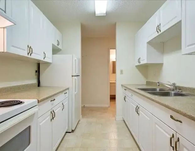 Lombardy Park Apartments | 1314 Lawson Avenue, Kelowna - Photo 1