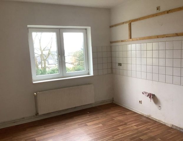 3-Zimmer-Erdgeschosswohnung mit großer Küche! - Foto 1