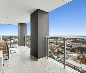 Sleek Apartment with Skyline Views - Photo 4