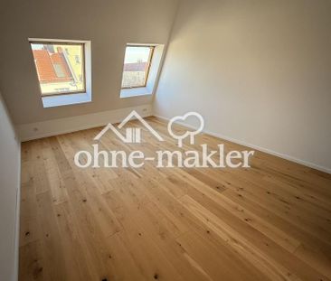Bezugsfreie 3-Zimmer-Penthousewohnung mit Dachterrasse in Charlotte... - Foto 2