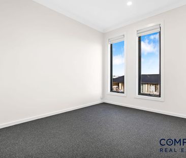 Beautifully Designed Four-Bedroom Home with Modern Comforts - Photo 2