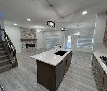 Elegant New Home with a Legal, Modern Basement Suite! | Silverton Gln Cres SW, Calgary - Photo 1