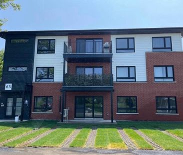 Beaux 4 1/2 NEUFS, quartier tranquille, dès maintenant; Rue Armand - Photo 2